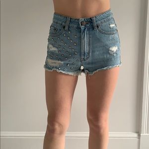 BDG distressed studded high rise cheeky shorts